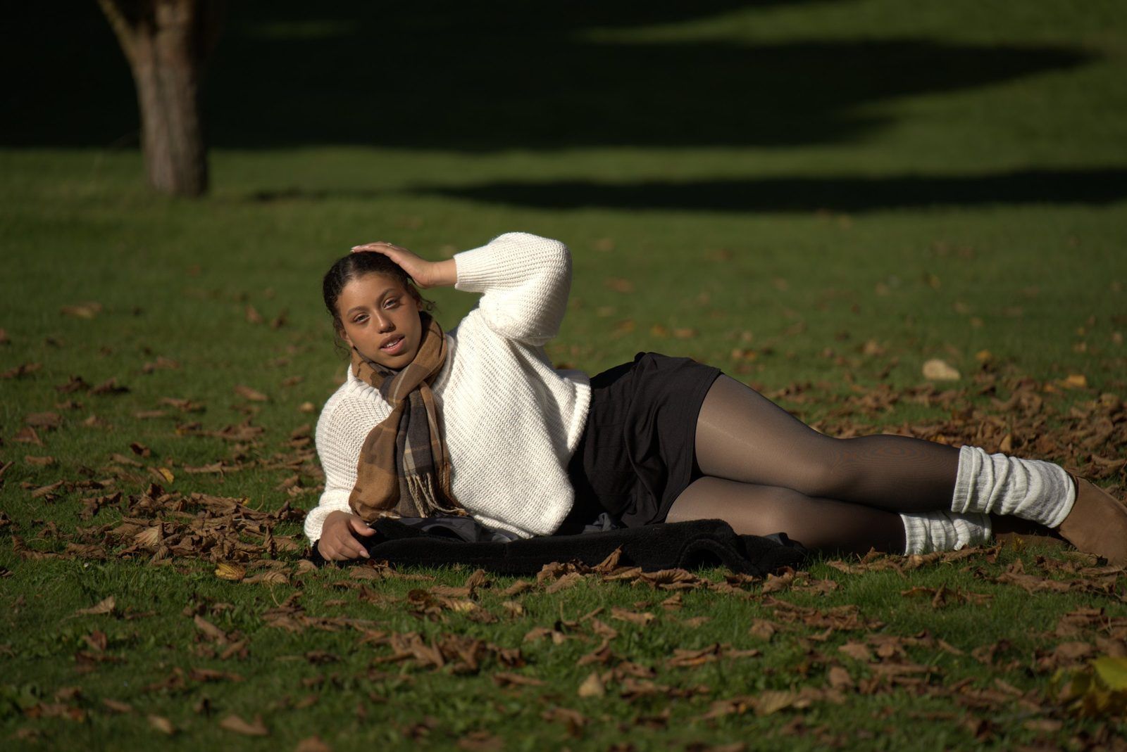 Portrait lying in the autumn grass